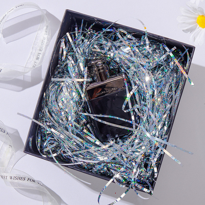 Laser bright colored silk gift box with hand gift, candy box with padding and dazzling colored silk raffiti grass